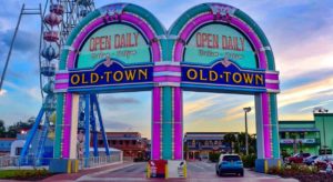 image-of-entrance-to-old-town-kissimmee-florida-during-dusk-with-blue-car-to-explain-where-cypress-palms-timeshare-resort-is-located-for-tax-assessment-lawsuit