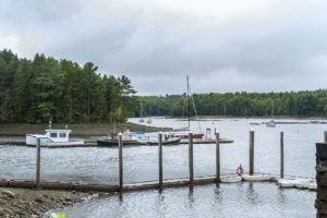 portrait-of-old-port-in-ellsworth-maine-where-tourists-have-abandoned-timeshare-resort-acadia-village-due-to-bad-upkeep-and-management