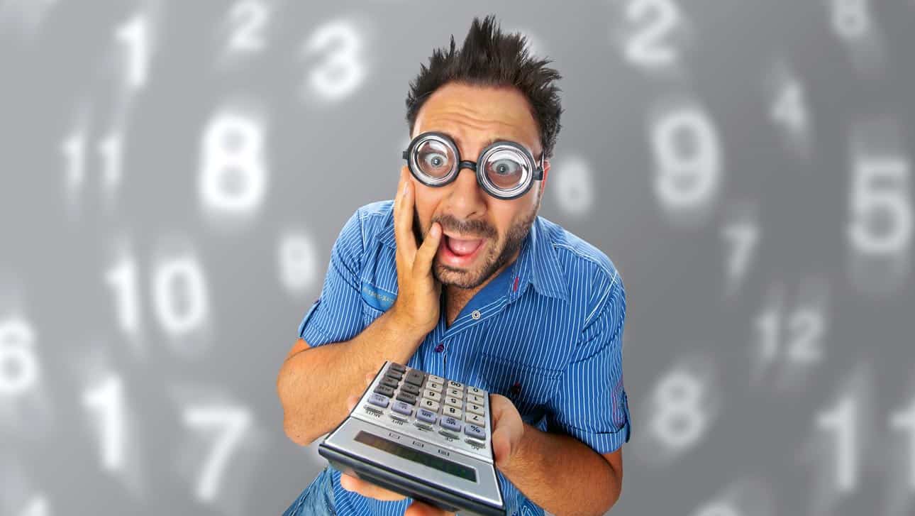 overwhelmed-young-man-goofy-glasses-holding-calculator-trying-to-determine-how-he-will-pay-for-timeshare-debt-while-resort-giants-ignore-his-complaints-numbers-everwhere