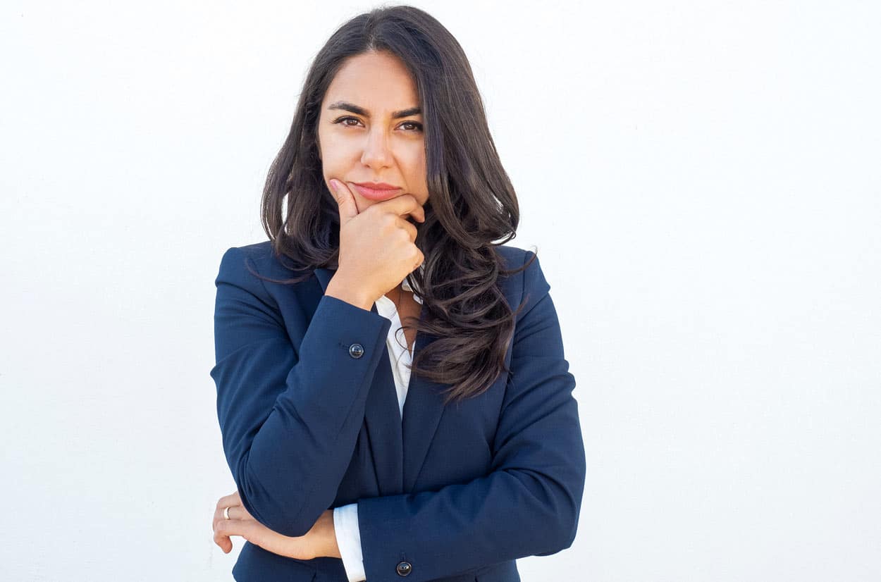 stern-looking-younger-business-woman-thinking-about-important-decision-to-give-into-timeshare-presentation-false-promises-just-to-receive-free-gift-white-background