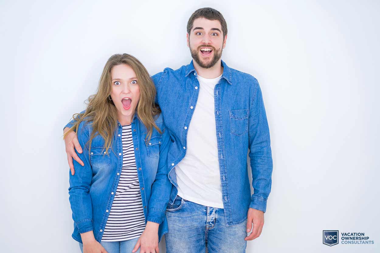 eager-young-boyfriend-girlfriend-during-timeshare-presentation-perspective-of-consumer-jean-outfits-white-background