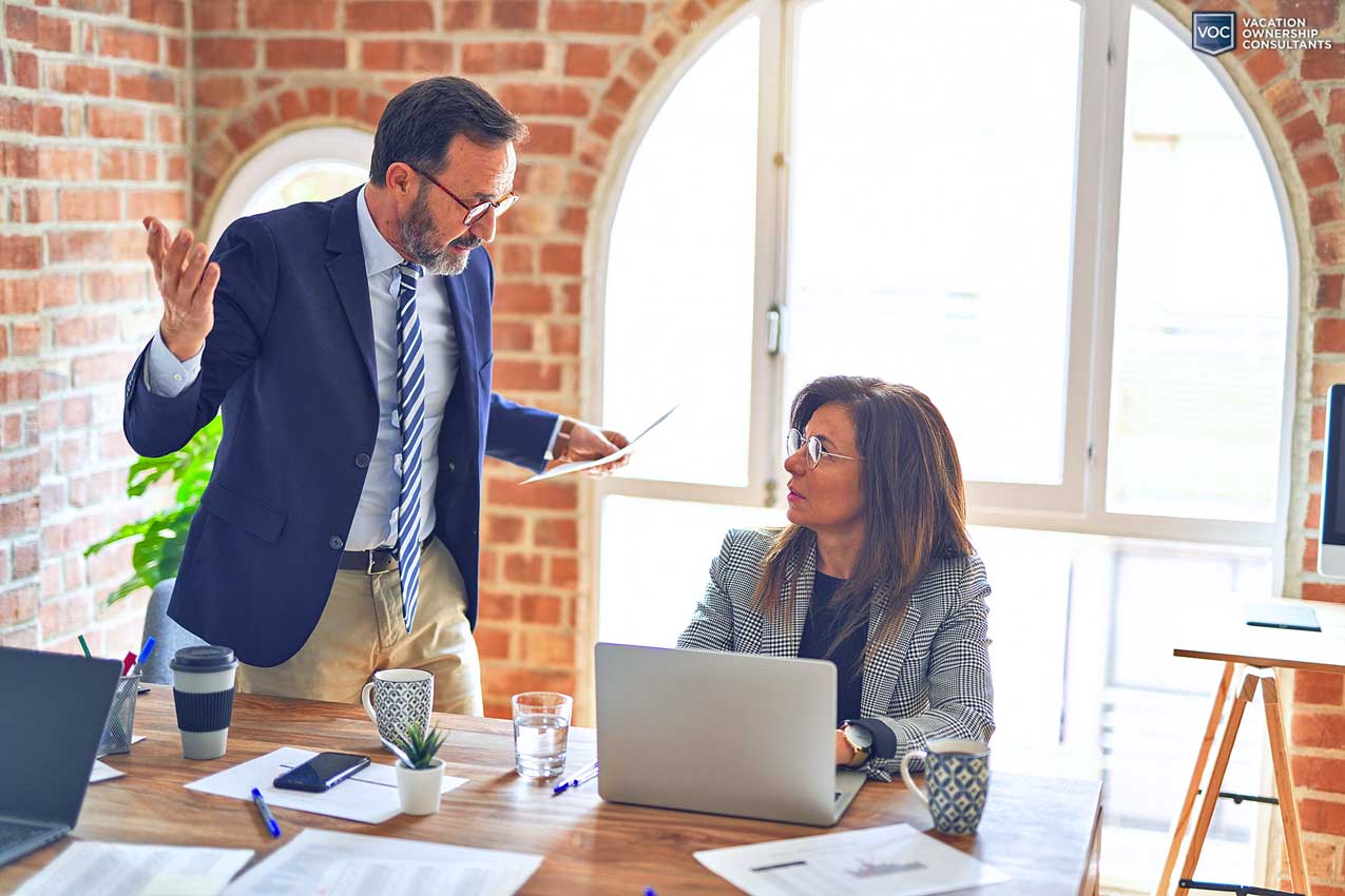 unhappy-couple-discussing-burden-of-owning-vacation-property-after-lies-timeshare-organization-spewed-at-them-during-presentation